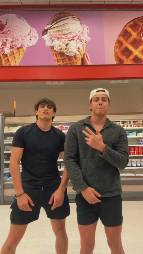 Kyle Abellar smiling in a casual portrait outdoors